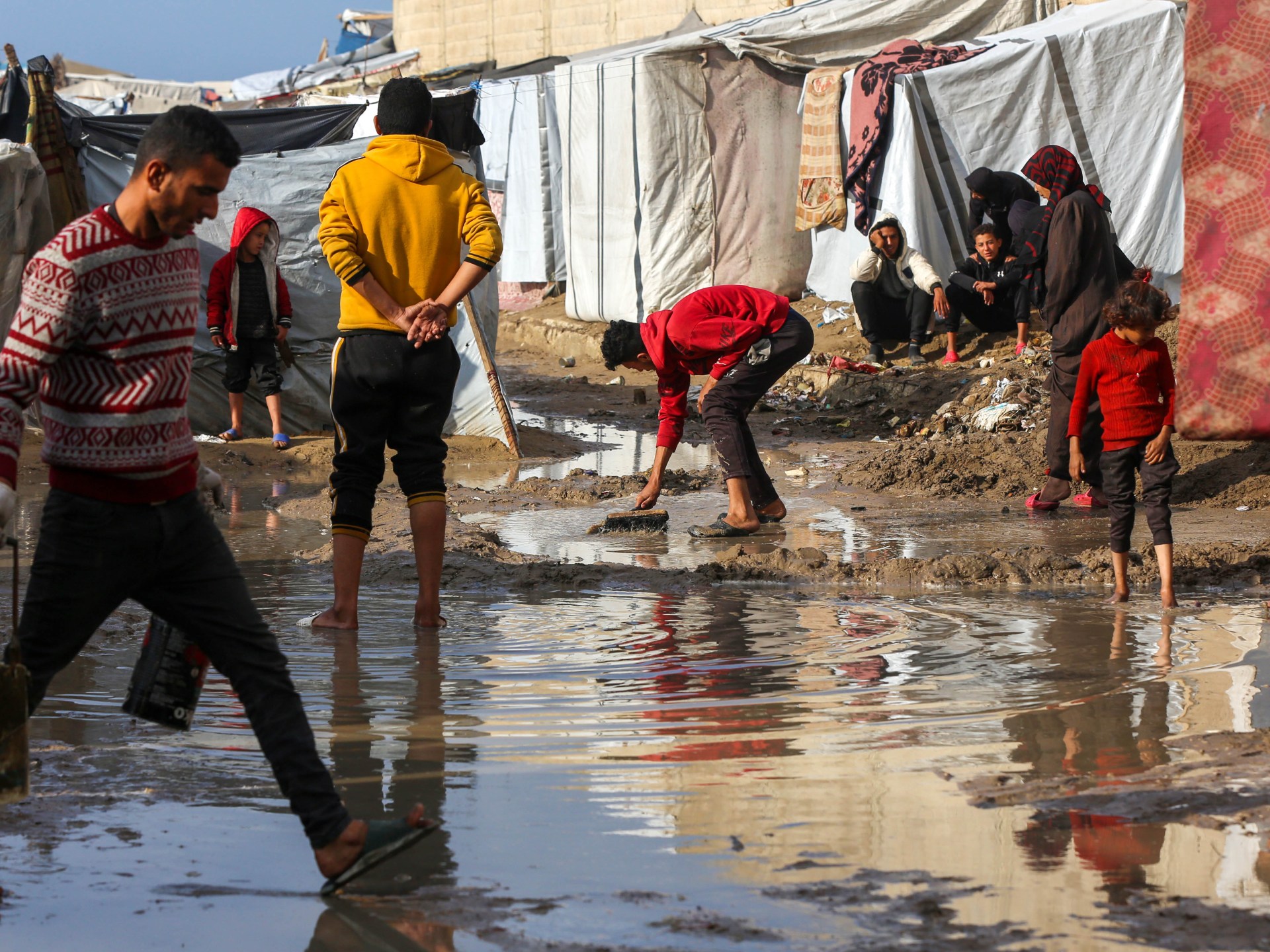 Winter rains worsen horrors faced by displaced Palestinians in Gaza | Israel-Palestine conflict News